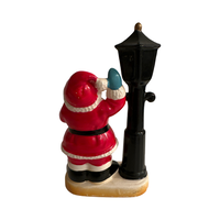 Load image into Gallery viewer, Vintage Santa with Presents by Lamp Post Figurine
