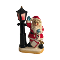 Load image into Gallery viewer, Vintage Santa with Presents by Lamp Post Figurine
