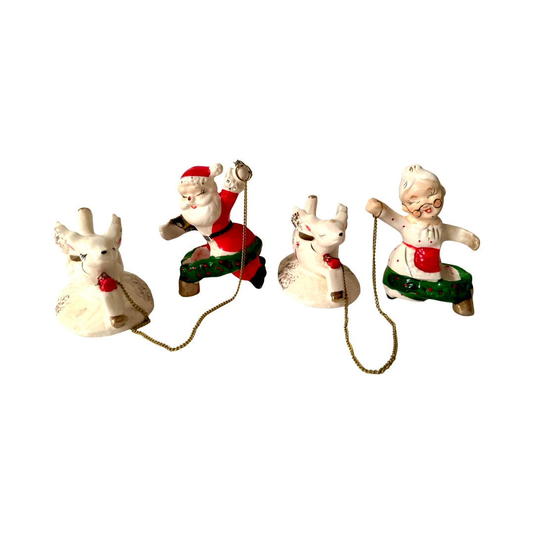 Vintage Commadore Mr. and Mrs. Santa Claus Candle Climber Set