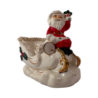 Load image into Gallery viewer, Napco Santa on Sled with Spaghetti Trim Planter
