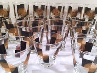Load image into Gallery viewer, Anchor Hocking - Mid-Century Black Square with 22-Karat Gold Atomic Burst Bar Set  (Set of 24 Glasses)
