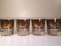 Load image into Gallery viewer, Fred Press - Signed Mid-Century Celestial/Atomic Burst 22-Karat Gold &amp; Black Whiskey Glasses (Set of 4)
