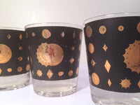 Load image into Gallery viewer, Fred Press - Signed Mid-Century Celestial/Atomic Burst 22-Karat Gold &amp; Black Whiskey Glasses (Set of 4)
