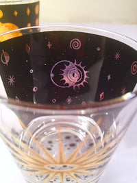 Load image into Gallery viewer, Fred Press - Signed Mid-Century Celestial/Atomic Burst 22-Karat Gold &amp; Black Whiskey Glasses (Set of 4)
