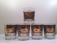 Load image into Gallery viewer, Fred Press - Signed Mid-Century Celestial/Atomic Burst 22-Karat Gold &amp; Black Whiskey Glasses (Set of 5)
