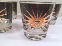 Load image into Gallery viewer, Fred Press - Signed Mid-Century Celestial/Atomic Burst 22-Karat Gold &amp; Black Whiskey Glasses (Set of 5)
