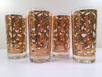 Load image into Gallery viewer, Georges Briard - Signed Mid-Century 22-Karat Gold Fleur-De-Lis Highball Glasses (Set of 4)
