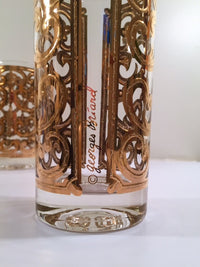 Load image into Gallery viewer, Georges Briard - Signed Mid-Century 22-Karat Gold Fleur-De-Lis Highball Glasses (Set of 4)

