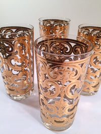 Load image into Gallery viewer, Georges Briard - Signed Mid-Century 22-Karat Gold Fleur-De-Lis Highball Glasses (Set of 4)
