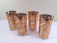 Load image into Gallery viewer, Georges Briard - Signed Mid-Century 22-Karat Gold Fleur-De-Lis Highball Glasses (Set of 4)
