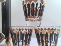 Load image into Gallery viewer, Fred Press Signed Mid-Century Black and 22-Karat Gold Diamonds Retro 8-Piece Cocktail Set (1 Pitcher, 1 Carrier, 6 Glasses)
