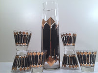 Load image into Gallery viewer, Fred Press Signed Mid-Century Black and 22-Karat Gold Diamonds Retro 8-Piece Cocktail Set (1 Pitcher, 1 Carrier, 6 Glasses)
