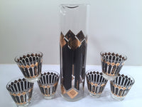 Load image into Gallery viewer, Fred Press Signed Mid-Century Black and 22-Karat Gold Diamonds Retro 8-Piece Cocktail Set (1 Pitcher, 1 Carrier, 6 Glasses)
