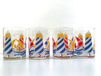 Load image into Gallery viewer, Culver Signed Mid-Century Sailboat and Lighthouse Double Old Fashion Glasses (Set of 4)
