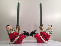 Load image into Gallery viewer, Jolly Ole St Nick Getting His Kick Candle Holders (Pair)
