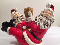 Load image into Gallery viewer, Jolly Ole St Nick Getting His Kick Candle Holders (Pair)
