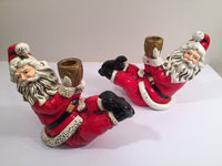 Load image into Gallery viewer, Jolly Ole St Nick Getting His Kick Candle Holders (Pair)
