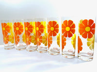 Load image into Gallery viewer, Colony Signed Retro Yellow and Orange Daisy Flower Power Tall Collins Glasses (Set of 7)
