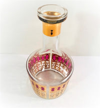 Load image into Gallery viewer, Culver Signed Mid-Century Cranberry Scroll 22-Karat Gold decanter
